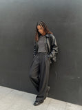 DAXUEN black and dark gray pinstriped wide-leg pants — model photo