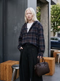 DAXUEN black pinstriped wide-leg trousers — model photo