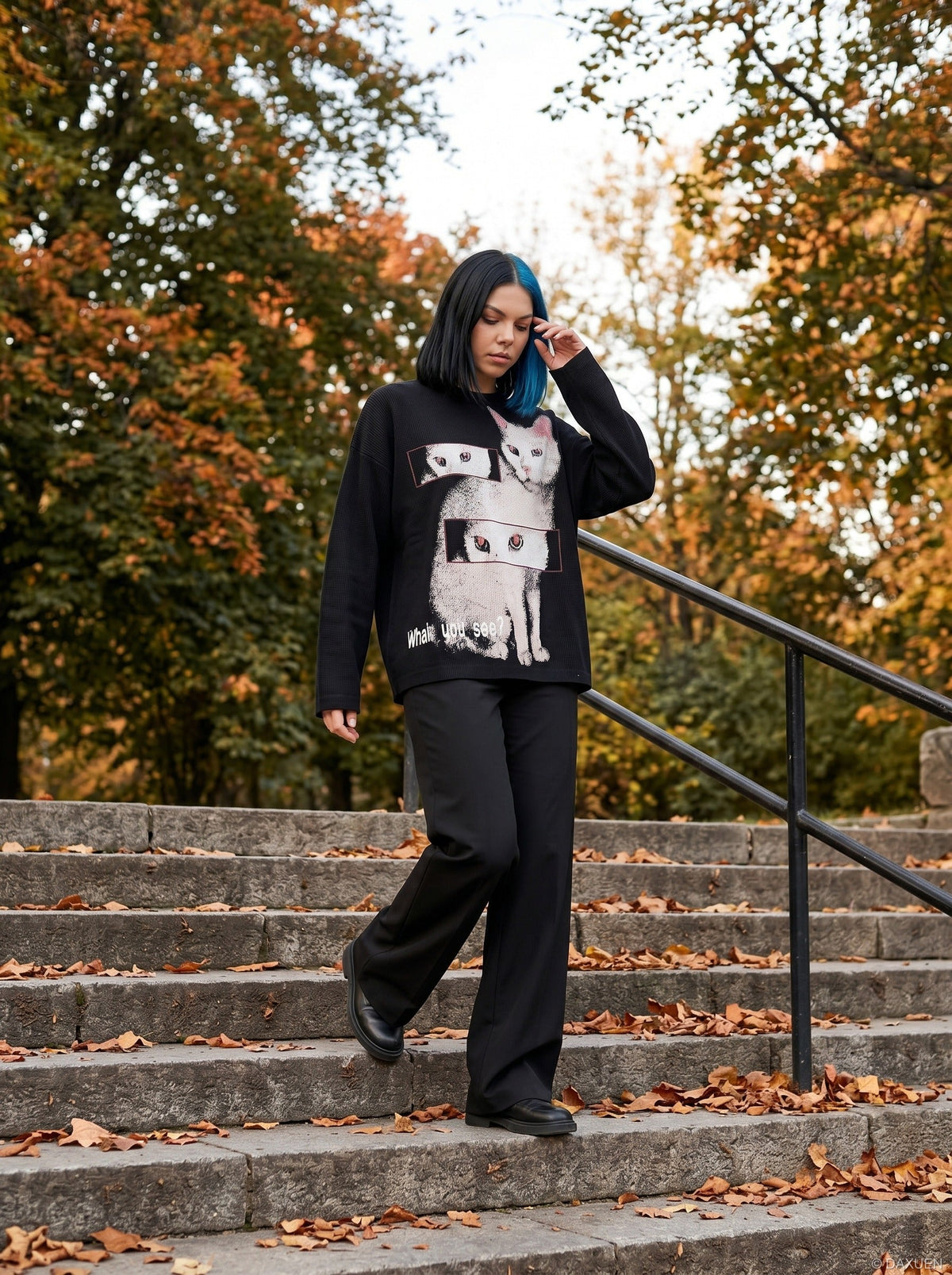 DAXUEN Black long sleeve sweatshirt with cat graphic — model photo