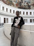 DAXUEN Black long sleeve sweatshirt with cat graphic — model photo
