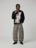 DAXUEN Black long sleeve sweatshirt with cat graphic — model photo