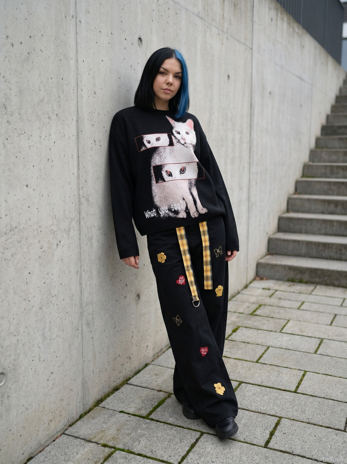 DAXUEN Black long sleeve sweatshirt with cat graphic — model photo