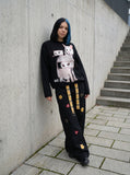 DAXUEN Black long sleeve sweatshirt with cat graphic — model photo