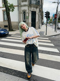 DAXUEN white oversized pixelated anime character tee — model photo