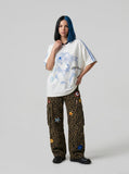 DAXUEN white oversized pixelated anime character tee — model photo
