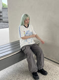 DAXUEN white oversized pixelated anime character tee — model photo