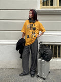DAXUEN Oversized short-sleeved T-shirt with pixelated graphic — model photo