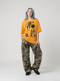 DAXUEN Oversized short-sleeved T-shirt with pixelated graphic — model photo