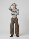 DAXUEN Cropped hooded long-sleeve top with pixelated graphics — model photo