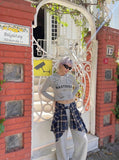 DAXUEN Cropped hooded long-sleeve top with pixelated graphics — model photo