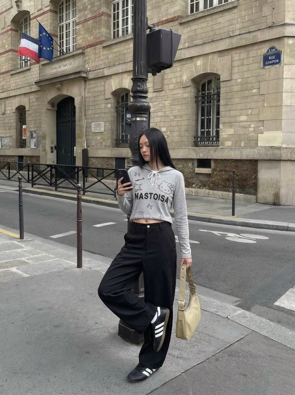 DAXUEN Cropped hooded long-sleeve top with pixelated graphics — model photo
