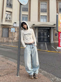 DAXUEN Cropped hooded long-sleeve top with pixelated graphics — model photo