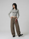 DAXUEN Cropped hooded long-sleeve top with pixelated graphics — model photo