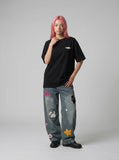 DAXUEN black pixelated portraits back graphic tee — model photo