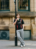DAXUEN black pixelated red panel graphic t-shirt — model photo