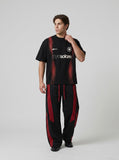 DAXUEN black pixelated red panel graphic t-shirt — model photo