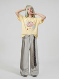 DAXUEN Loose-fitting plaid apple embroidered T-shirt — model photo