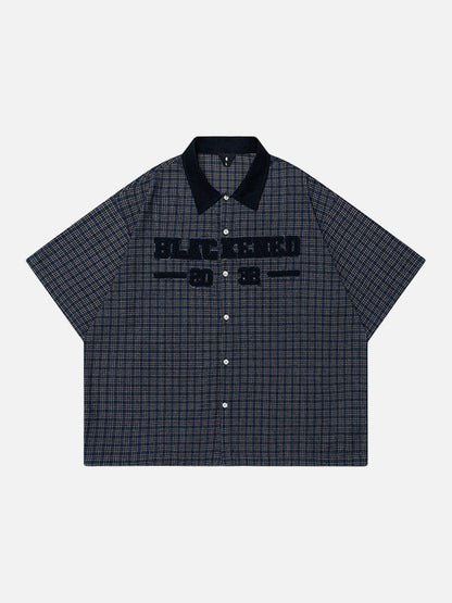 DAXUEN Men's short-sleeved plaid button-up shirt — model photo