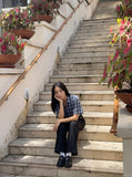 DAXUEN Short-sleeved plaid button-up shirt — model photo