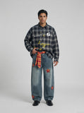DAXUEN Oversized dark plaid button-up shirt with graphics — model photo