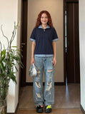 DAXUEN Plaid patchwork short-sleeved polo shirt — model photo
