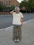 DAXUEN Plaid patchwork short-sleeved polo shirt — model photo