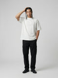 DAXUEN Oversized short-sleeved t-shirt with plaid script print — model photo