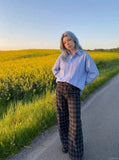 DAXUEN plaid and solid wide-leg denim pants — model photo