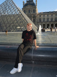 DAXUEN Graphic T-shirt featuring dogs and a cat — model photo