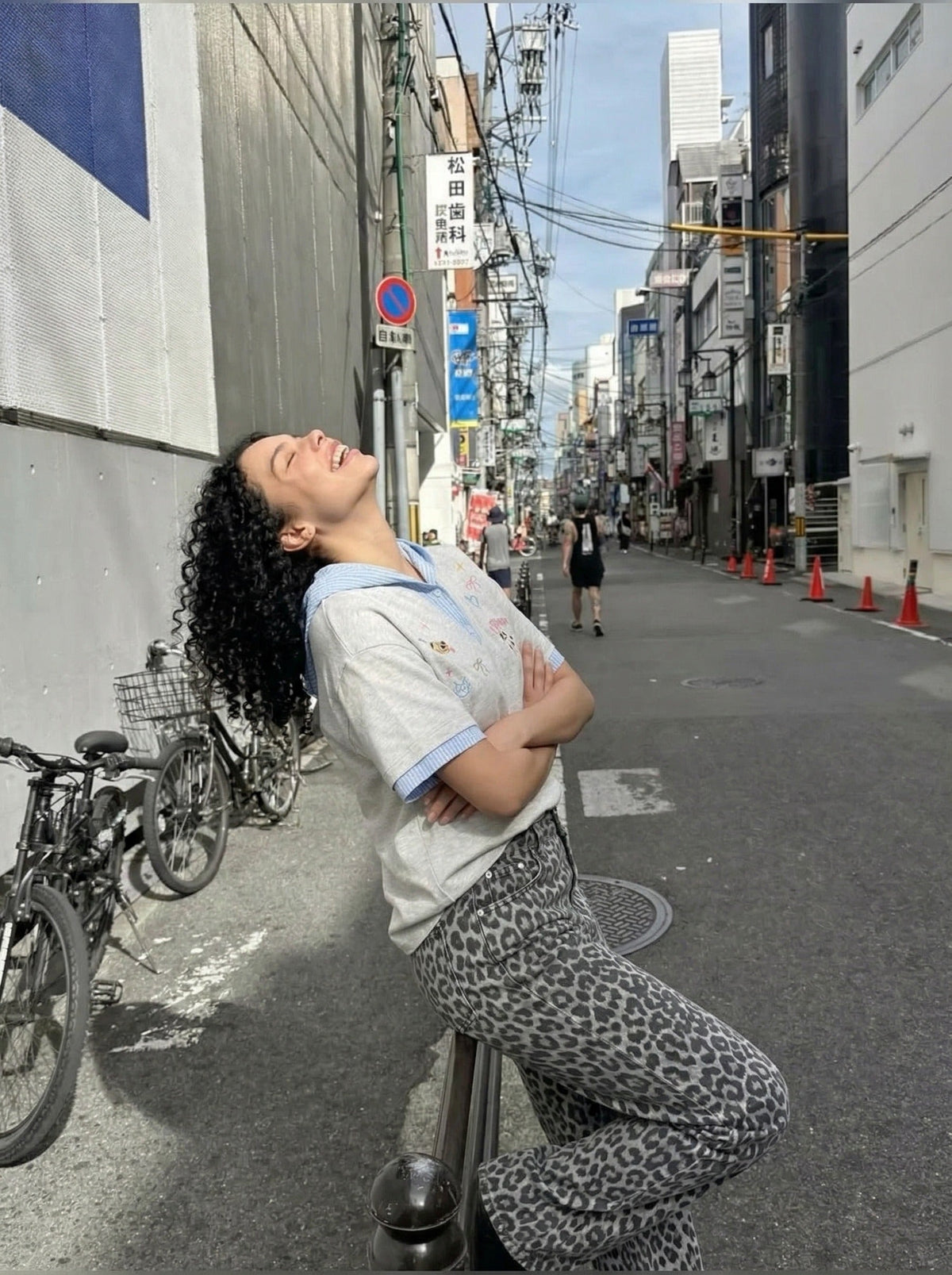 DAXUEN Playful hooded top with cartoon embroidery and striped details — model photo