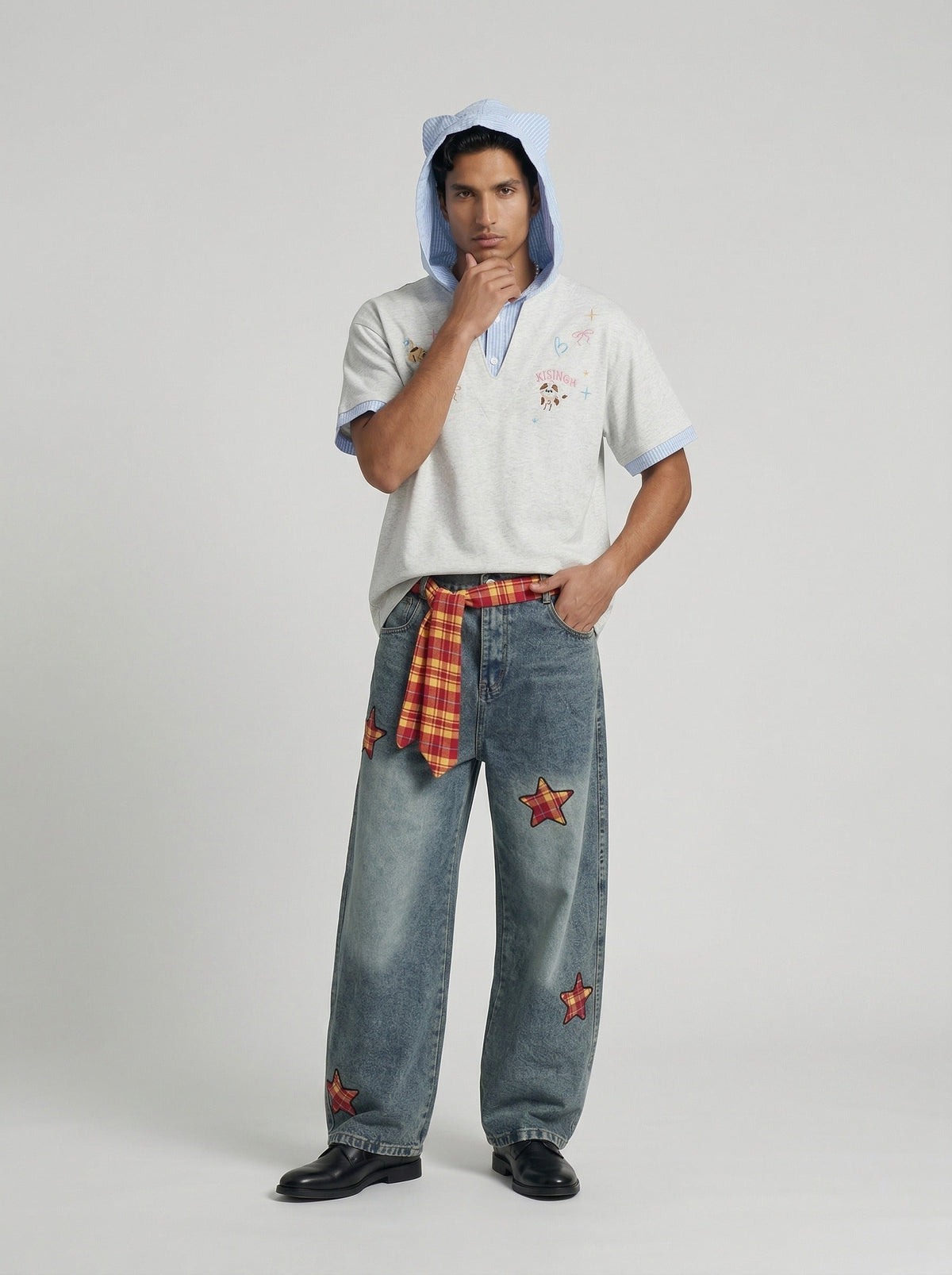 DAXUEN Playful hooded top with cartoon embroidery and striped details — model photo