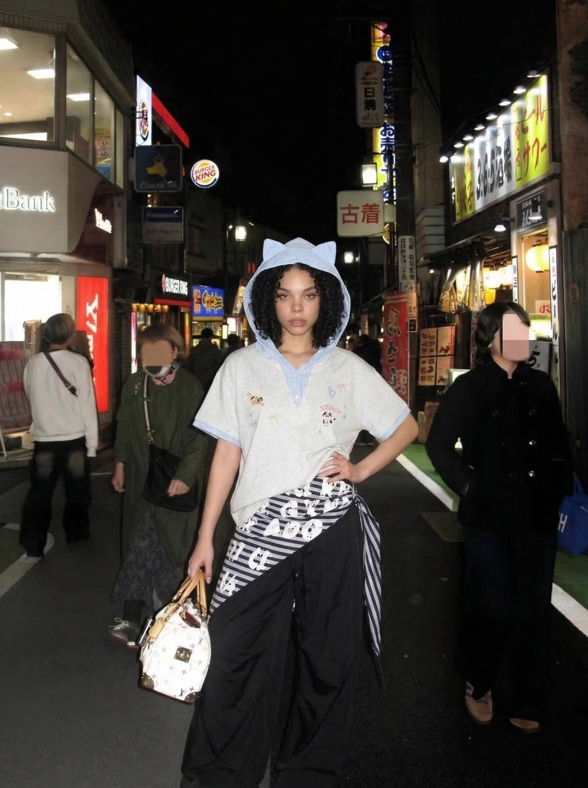 DAXUEN Playful hooded top with cartoon embroidery and striped details — model photo
