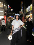 DAXUEN Playful hooded top with cartoon embroidery and striped details — model photo