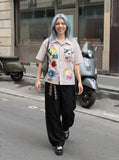DAXUEN Short-sleeved collared shirt with cartoon cat embroideries — model photo