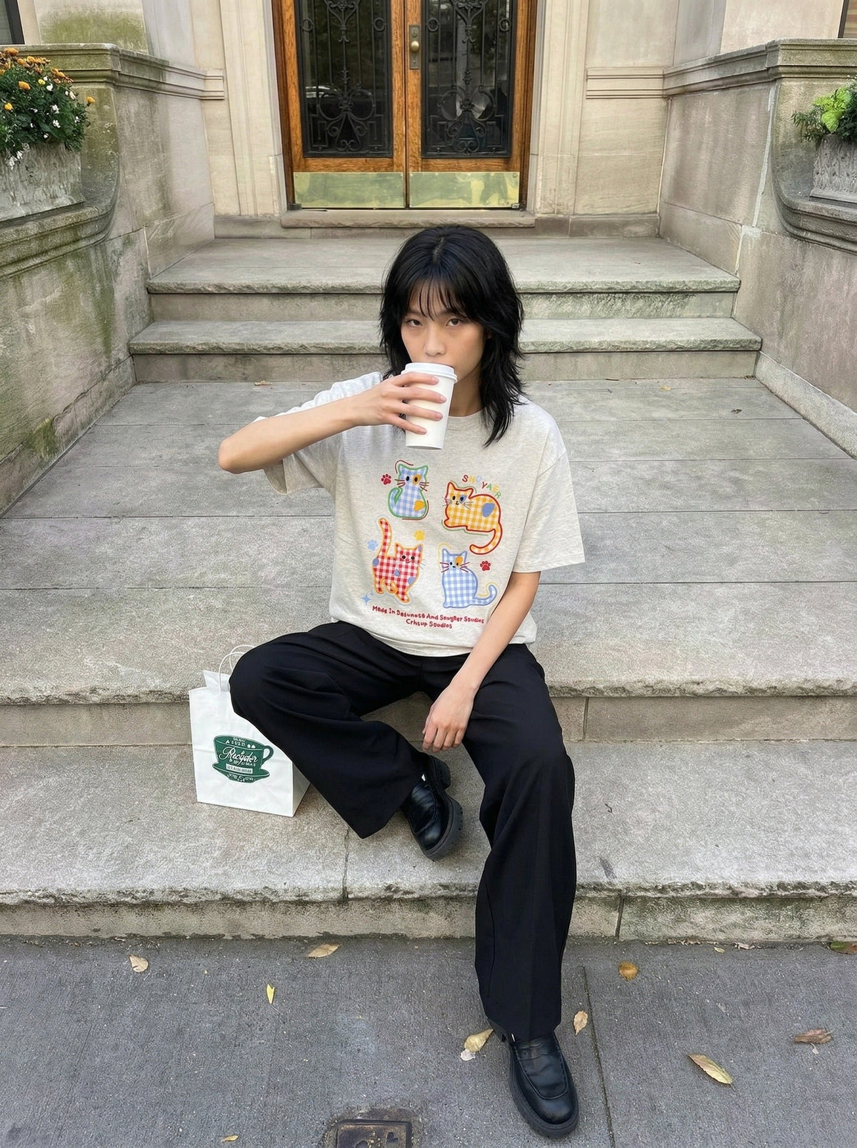 DAXUEN Playful cat graphic t-shirt — model photo