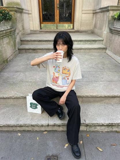 DAXUEN Playful cat graphic t-shirt — model photo