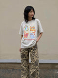 DAXUEN Playful cat graphic t-shirt — model photo