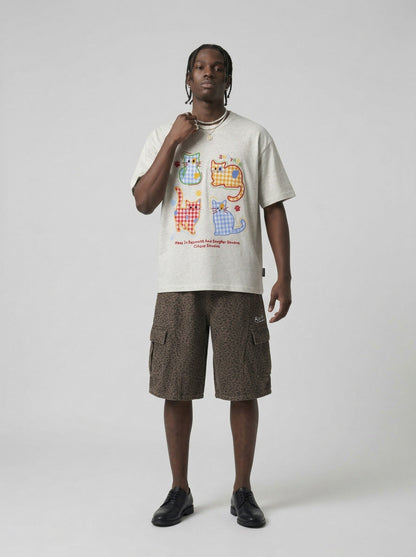 DAXUEN Playful cat graphic t-shirt — model photo