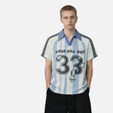 DAXUEN light blue and white striped playful graphic polo top