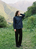 DAXUEN dark blue denim shirt with arrow-button details — model photo