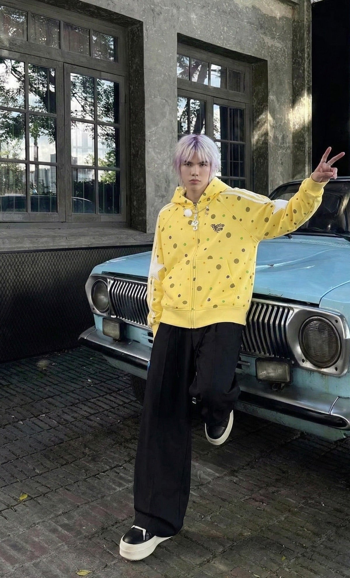DAXUEN Polka dot full-zip hooded sweatshirt — model photo