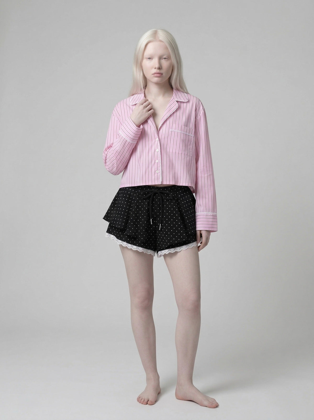 DAXUEN Women's polka dot ruffled lounge shorts — model photo