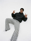 DAXUEN dark blue polka dot palazzo pants — model photo