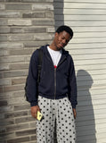 DAXUEN dark blue polka dot palazzo pants — model photo