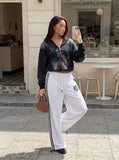 DAXUEN Wide leg polka dot trousers with stripes — model photo
