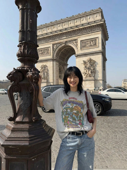 DAXUEN Graphic t-shirt featuring aliens at a pool party — model photo