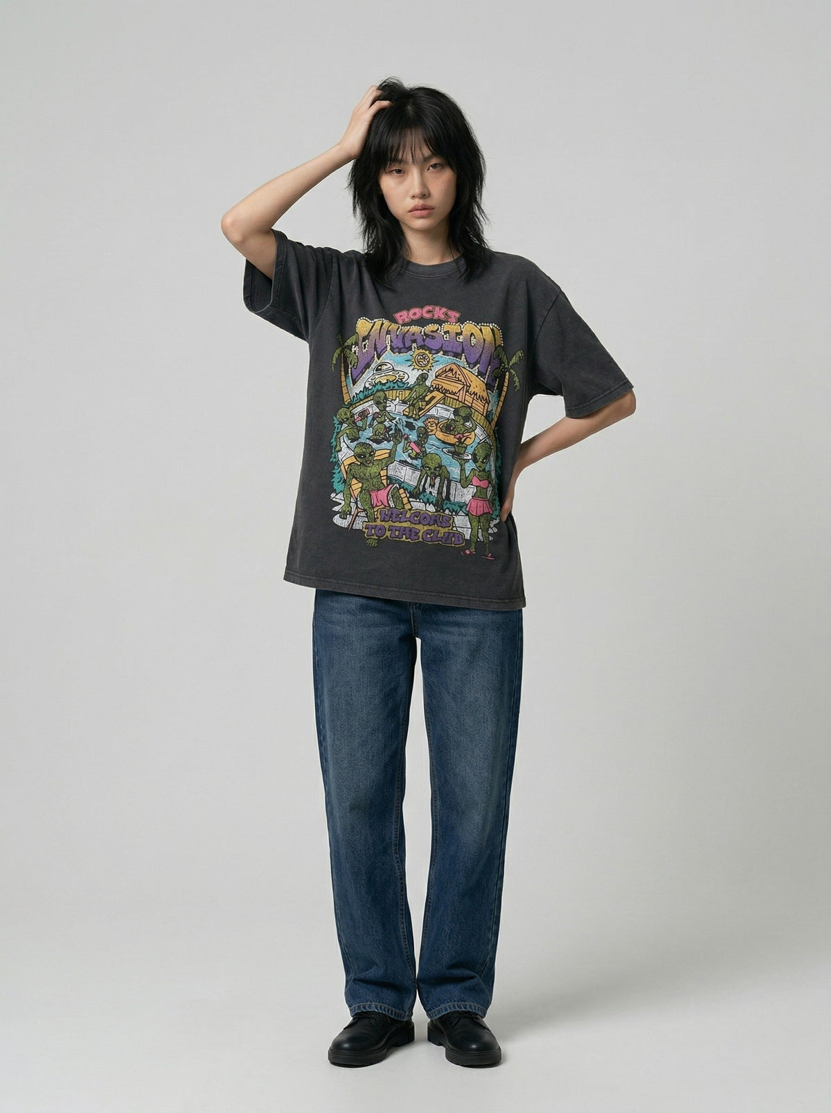DAXUEN Graphic t-shirt featuring aliens at a pool party — model photo