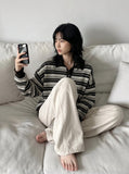 DAXUEN Oversized wide-leg pants with puddle effect — model photo