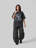 DAXUEN dark grey acid-wash graphic tee with punk portraits — model photo