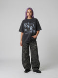 DAXUEN dark grey acid-wash graphic tee with punk portraits — model photo